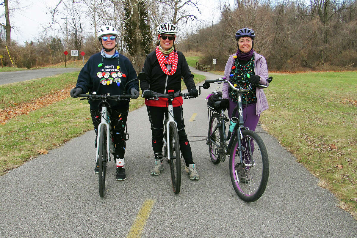 Left to right, cyclists Kelly Stelmach of Maryville, Vicki Cocker of Collinsville and Paula Ormrod of Troy took advantage of Thursday’s unseasonably warm weather to hit the biking trail at Southern Illinois University Edwardsville. The trio started at Drost Park in Maryville and were on their way to Horseshoe Lake, with a lunch stop at Taste of Country in Granite City before returning to Drost Park.