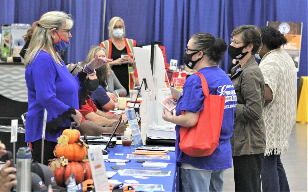 Potential workers and employers meet at the annual Jobs Plus job fair, co-sponsored by Madison County Employment and Training. In November unemployment dropped to below 4 percent.