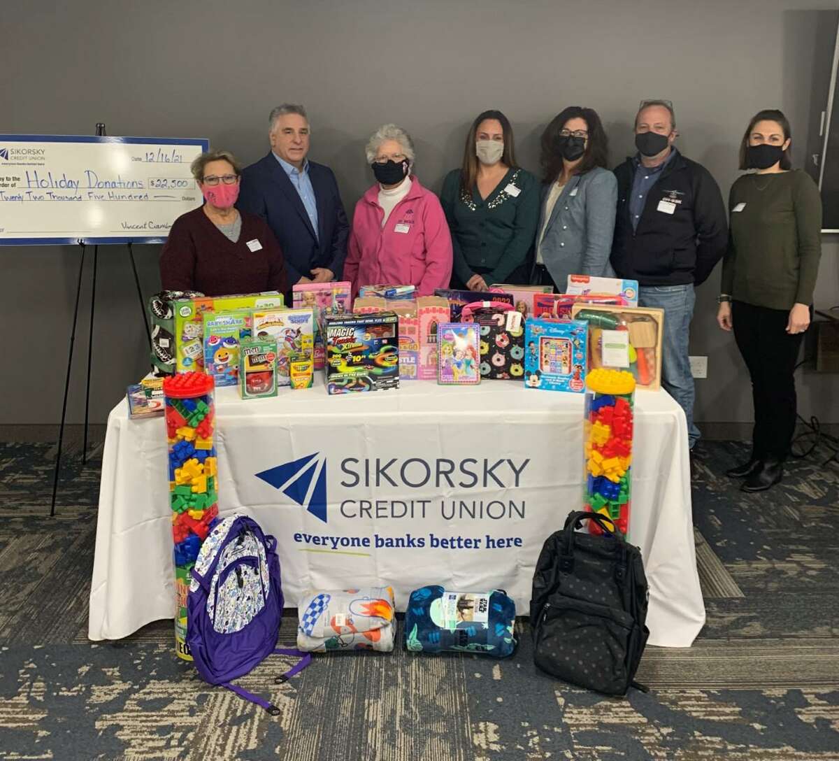 In addition to hosting toy drives in all of its branch locations, the Sikorsky Credit Union has recently donated $22,500 to local non-profit organizations to help brighten the current holiday season. Over 200 toys were collected during the toy drives for children, and were donated to the Sterling House in Stratford, the Community Action Agency of Western Connecticut, the Boys and Girls Club of Milford, the McGivney Center in Bridgeport, the Danbury Youth Services department, and the Boys and Girls Club of the Lower Naugatuck Valley. In addition to toys, each of the non-profit organizations, and Impact Trumbull, the Center for Family Justice in Bridgeport, and Seymour Pink, received a $2,500 holiday donation from Sikorsky Credit Union. A photo from the happenings, is shown.