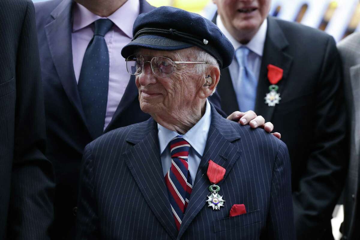 Benjamin Ferencz receives the Legion of Honor Insignia from French Minister of Defense Jean-Yves in 2015. Ferencz has made his quest for justice and peace today as important as his prosecution of war criminals in Nuremberg years ago.
