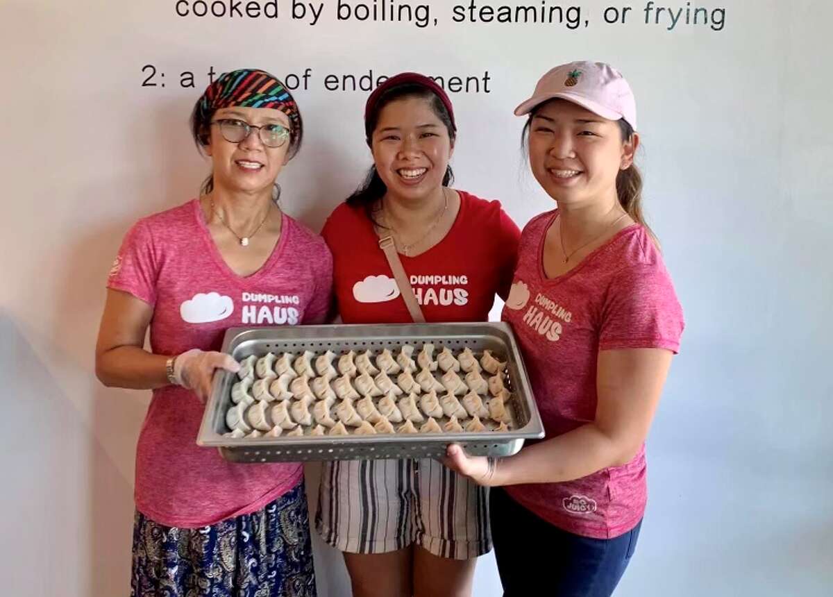 From left: Elaine Won, Ashley Lai and Amiley Lai with their staple dumplings at Dumpling Haus in Houston.