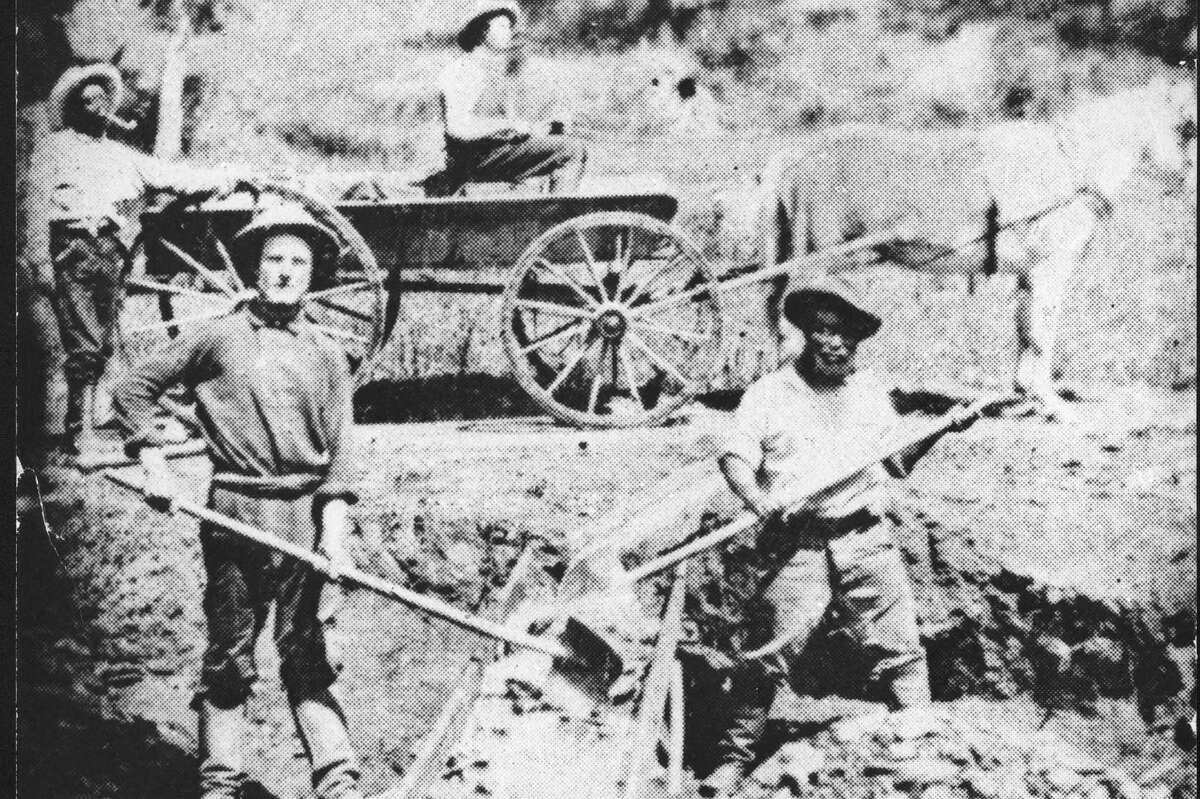 Slaves work in California gold mines in 1852.
