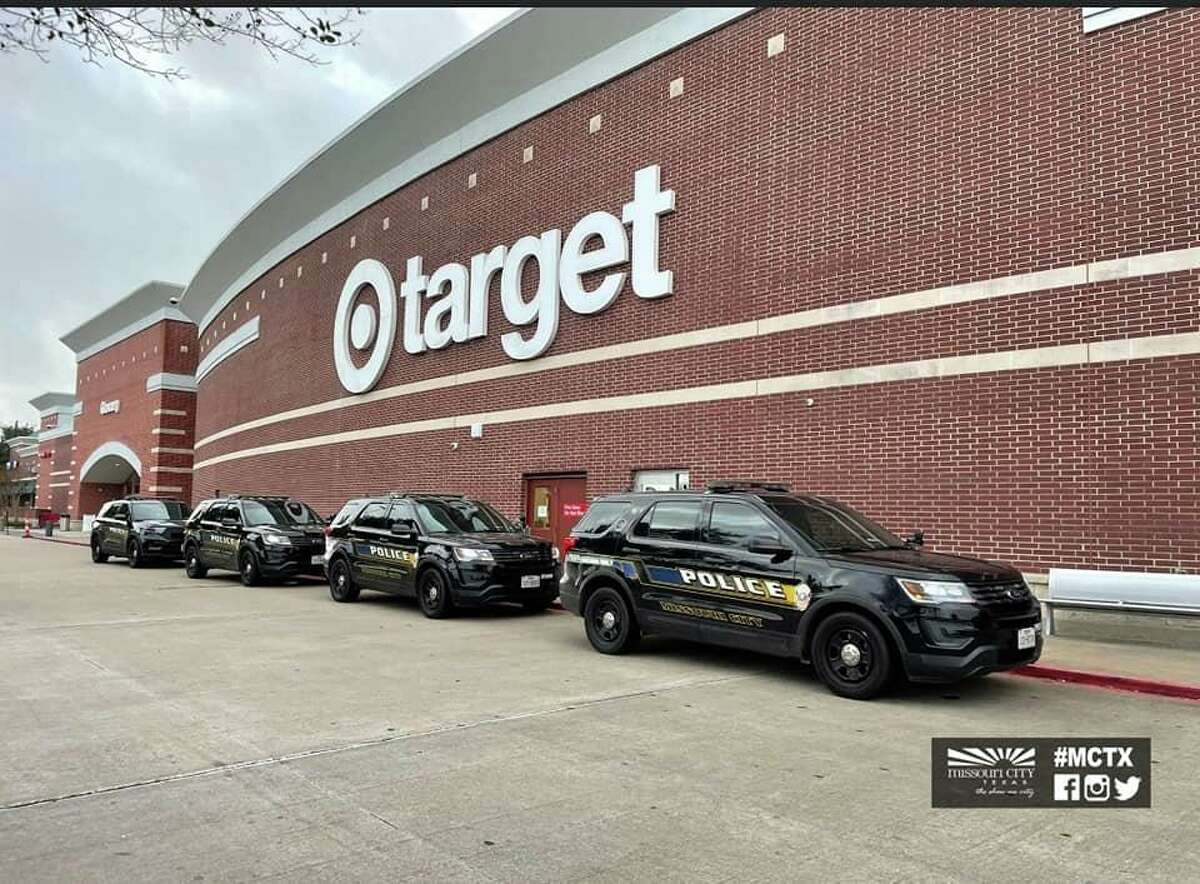 Missouri City Police Department patrol cars parked in front of Target on Saturday, Dec. 18, for the annual Shop with a Cop event.
