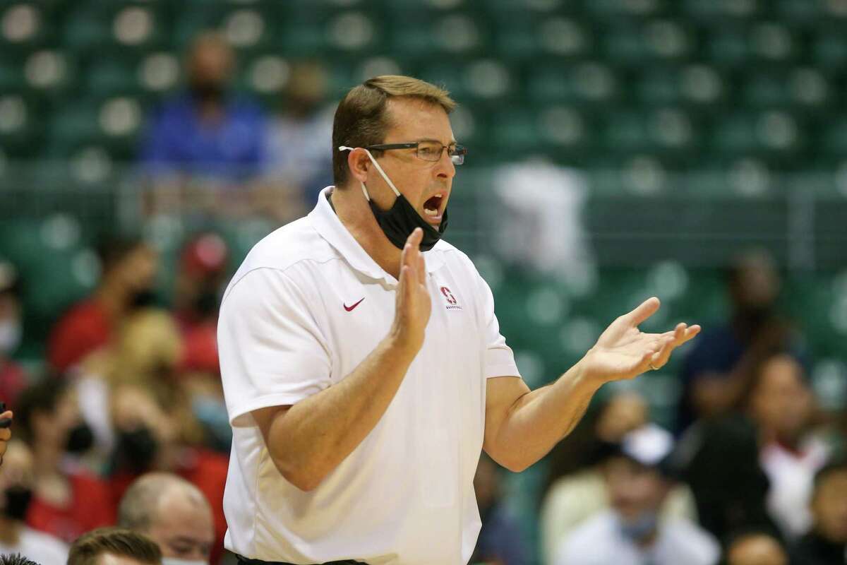 HONOLULU, HI - DECEMBER 23: Head coach Jerod Haase of the Stanford Cardinal cheers on his team during the 2021 Diamond Head Classic game against the Liberty Flames at the Stan Sheriff Center on December 23, 2021 in Honolulu, Hawaii. (Photo by Darryl Oumi/Getty Images)