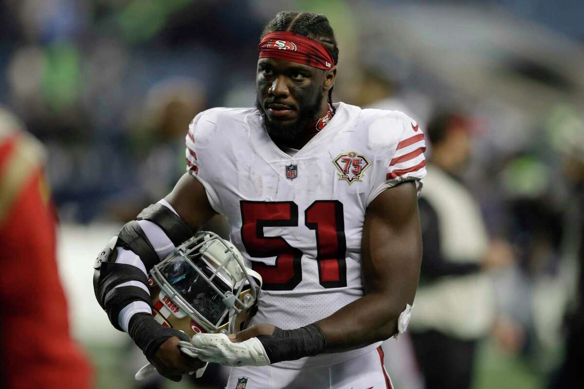 San Francisco 49ers linebacker Azeez Al-Shaair (51) is introduced before an  NFL divisional round playoff football game against the Dallas Cowboys in  Santa Clara, Calif., Sunday, Jan. 22, 2023. (AP Photo/Godofredo A.