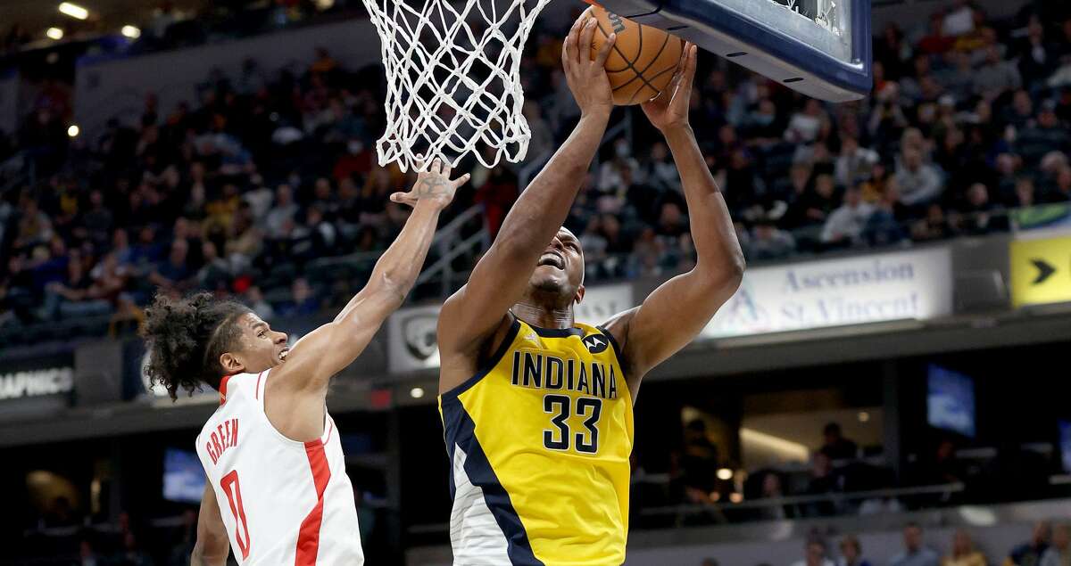 Myles Turner #33 of the Indiana Pacers shoots the ball against the Houston Rockets at Gainbridge Fieldhouse on December 23, 2021 in Indianapolis, Indiana. (Photo by Andy Lyons/Getty Images)