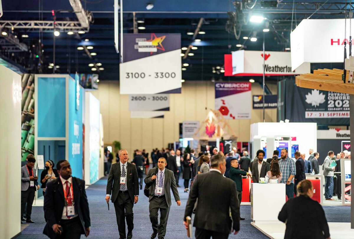 Attendees walk through the exhibition hall during the first day of the World Petroleum Congress last month. Skepticism about the speed of the energy transition emerged as a theme.