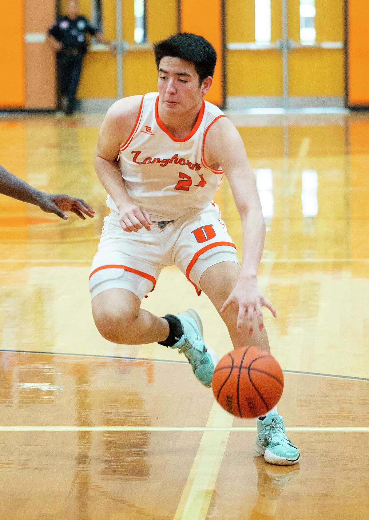 United High School Victor Koo moves the ball down the court during a game against Clemens High School, Saturday, Dec. 18, 2021 at United High School.