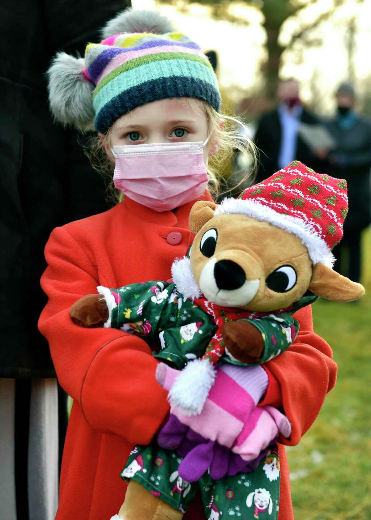 Charlotte Wussler, 6, attends Second Congregational Church's Outdoor Christmas Pageant and Petting Zoo in Greenwich, Conn., on Friday December 24, 2021. "The hope and joy of Christmas lift our spirits in any year," says Senior Minister Maxwell Grant. "We wanted to make sure we offered a safe way for friends to gather, and for kids to keep teaching us the story."