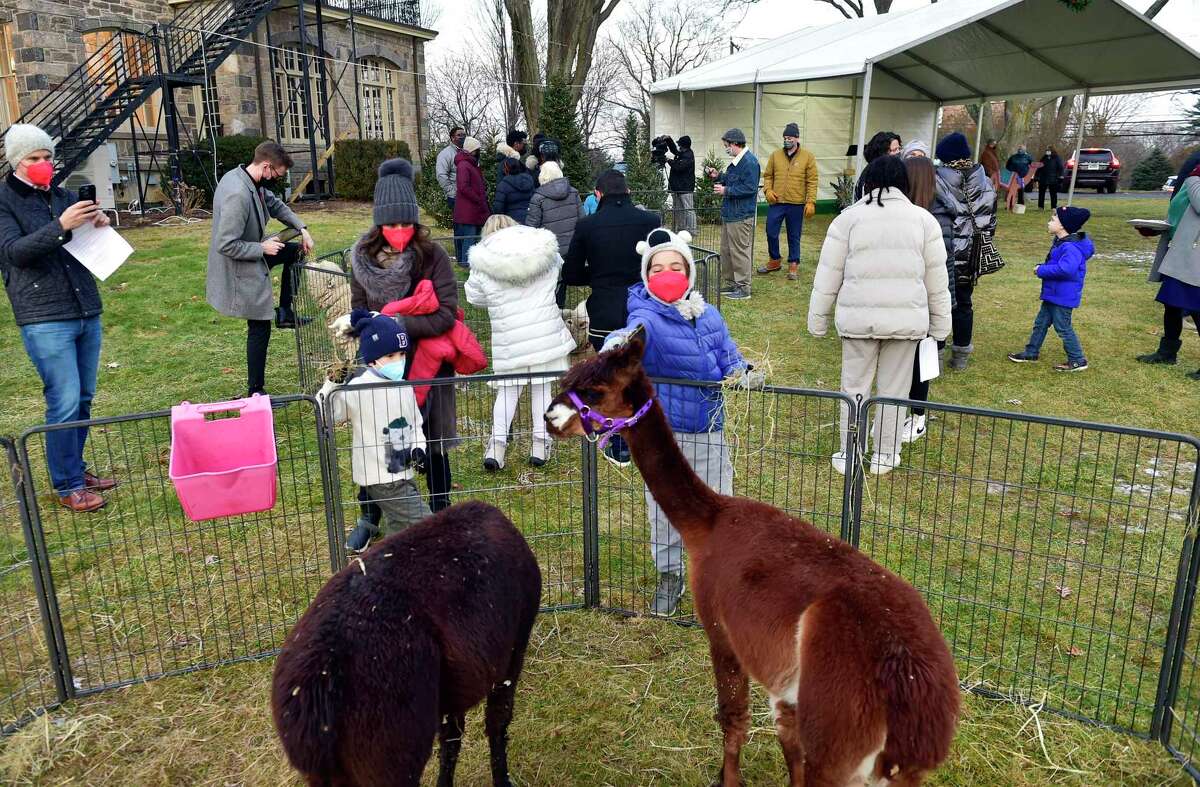 Second Congregational Church holds an Outdoor Christmas Pageant and Petting Zoo in Greenwich, Conn., on Friday December 24, 2021. "The hope and joy of Christmas lift our spirits in any year," says Senior Minister Maxwell Grant. "We wanted to make sure we offered a safe way for friends to gather, and for kids to keep teaching us the story."