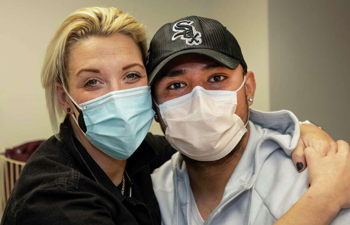 Kara Allen, left, didn’t know Alejandro “Alex” Alvarado before donating a kidney to him, but the two and their families now are friends.