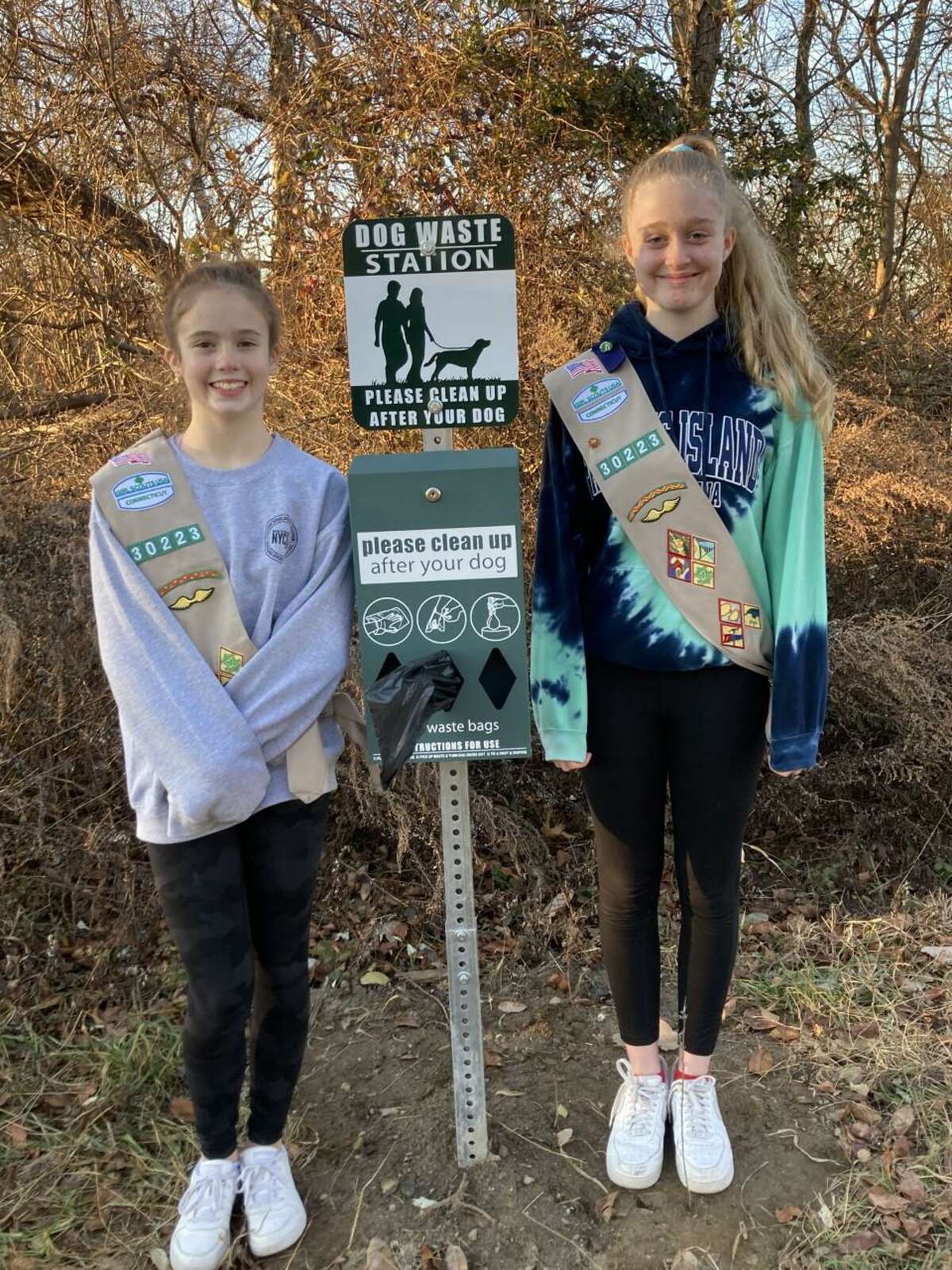 Fairfield Girl Scout Troop 30223 Girl Scouts Ayla Eyikan, and Teagan Weber, have completed a take action project, and are helping dog walkers to the trail in the Pine Creek Open Space in the town, become free of pet waste, with a pet “dog” waste station. The station is located at the entrance to the open space in the Sullivan Field/Kiwanis Field parking lot on Old Dam Road in Fairfield.