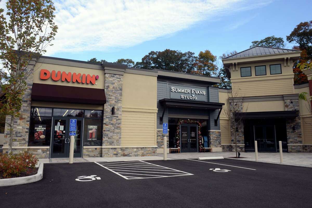Dunkin’ and Summer Evans Studio, two of the businesses in Long Hill Market, a new commercial plaza in Trumbull, Conn. Oct. 29, 2021.