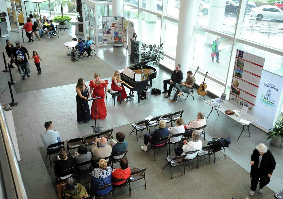 Liliya Bikbova and Yuliya Kirichenko sings a variety of classical opera songs, accompanied by pianist Alla Zouborev during a performance at the Stamford Government Center on June 18, 2019 in Stamford, Connecticut.
