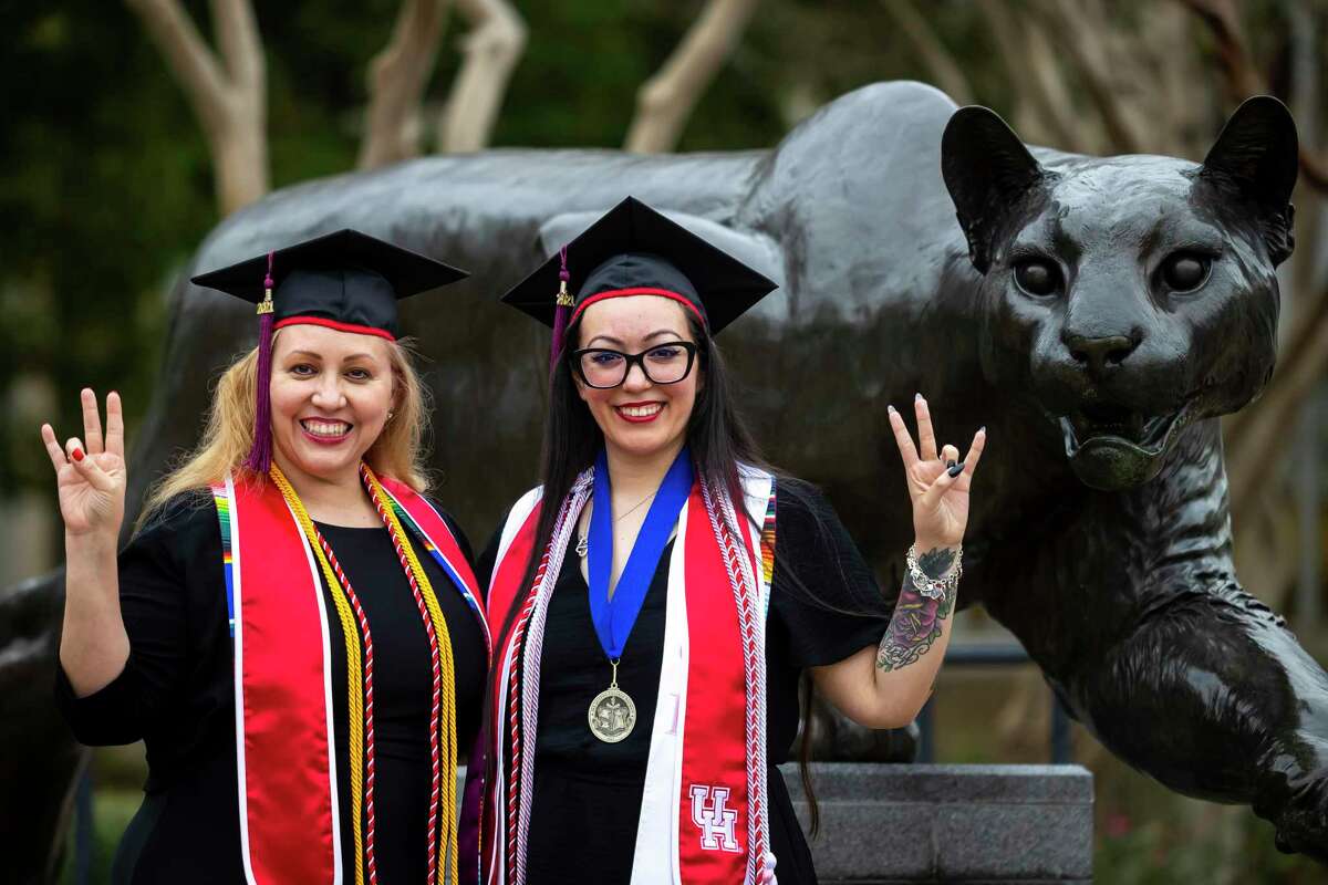 Mother and daughter Lisa and Victoria Lopez pose on campus at the University of Houston on Monday, Dec. 13, 2021. The Lopezes started their undergraduate degrees at UH with the intention of finishing/walking the stage together.