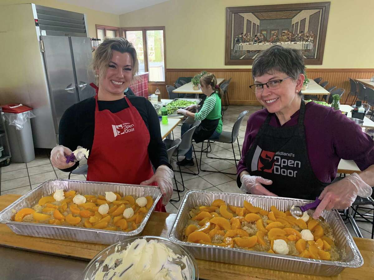 Volunteers make dessert at Midland's Open Door soup kitchen.