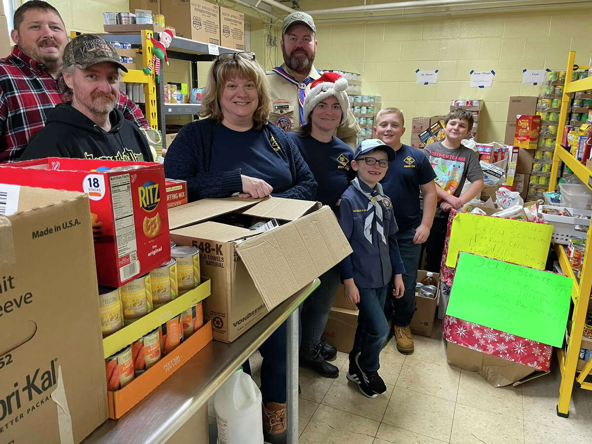 Members of the Cub Scouts Pack 174 Reed City were busy this holiday season. This year, the Scouting for Food program collected 3.5 tons of food for Project Starburst. Scouts and other volunteers worked hard to deliver and unload all of the goods. 