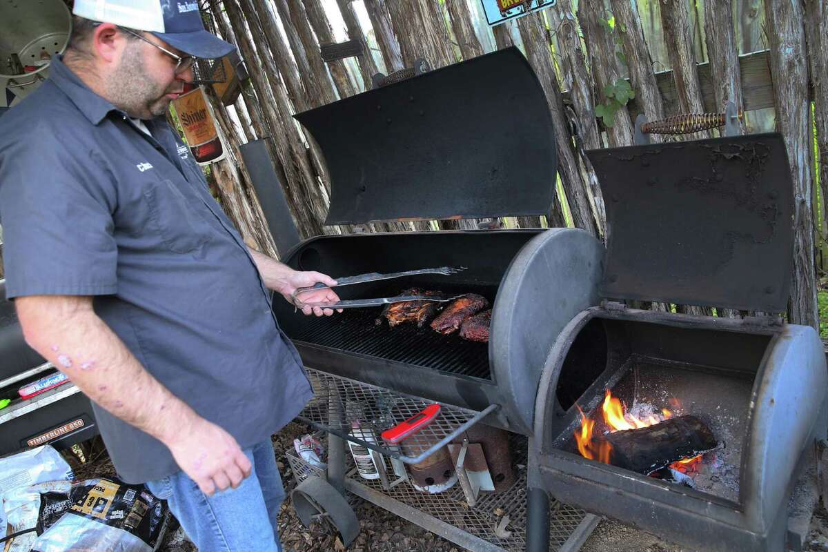 Chuck Blount prepares chicken, pork and brisket with walnut wood, a solid wood to use with whatever you are cooking.