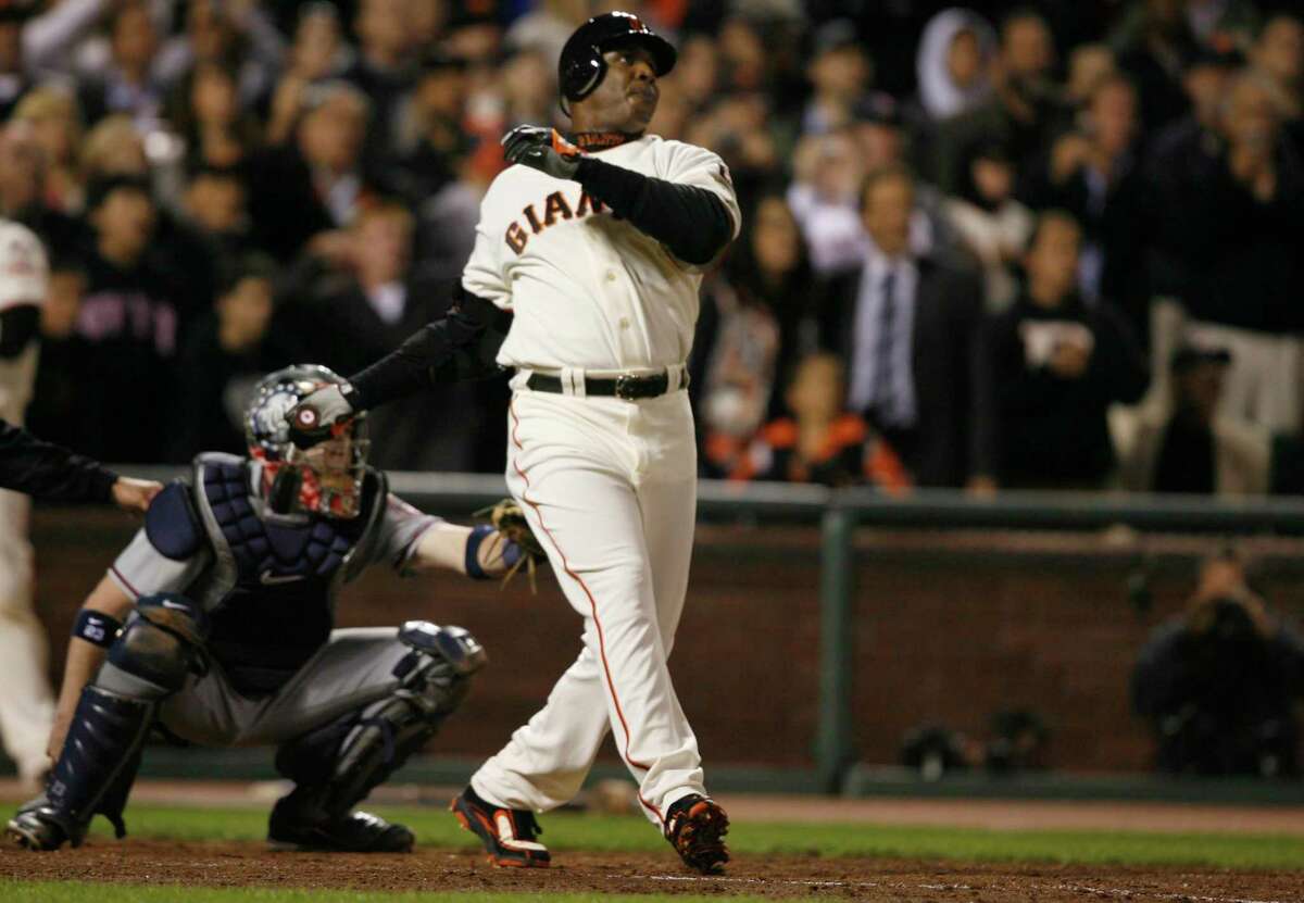 Barry Bonds belts his record-breaking 756th home run in the bottom of the fifth inning August 7, 2007.