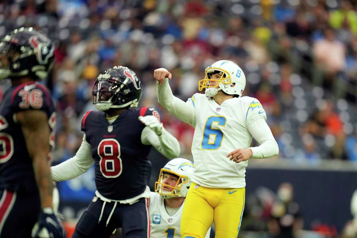 Los Angeles Chargers kicker Dustin Hopkins (6) watches his 50-yard field goal against the Houston Texans during the first half of the game.
