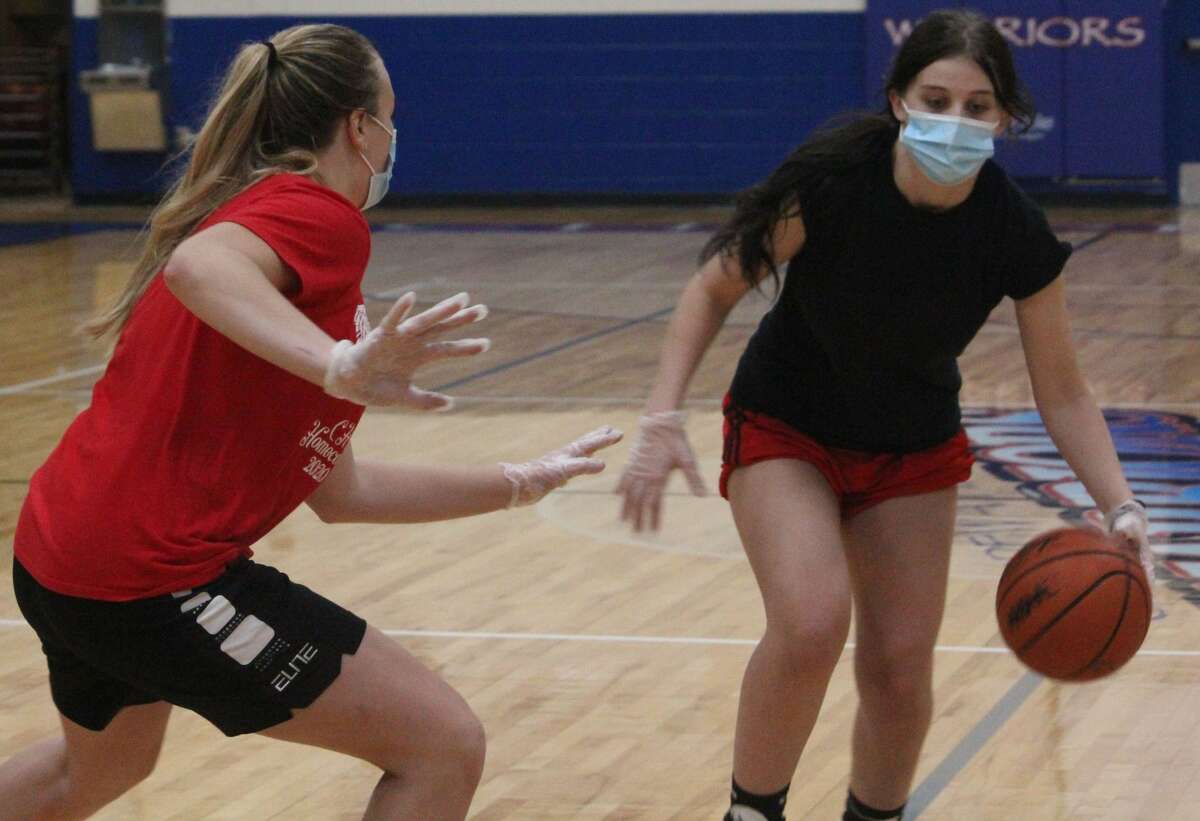 Chippewa Hills' Madison Wrisley (left) works on her defense during a previous girls basketball practice session.