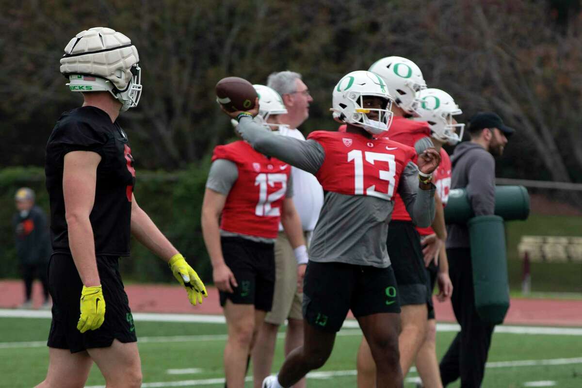 Oregon Ducks’ Bryan Addison throws the ball during practice at Trinity University ahead of the Alamo Bowl where they will face off against Oklahoma.
