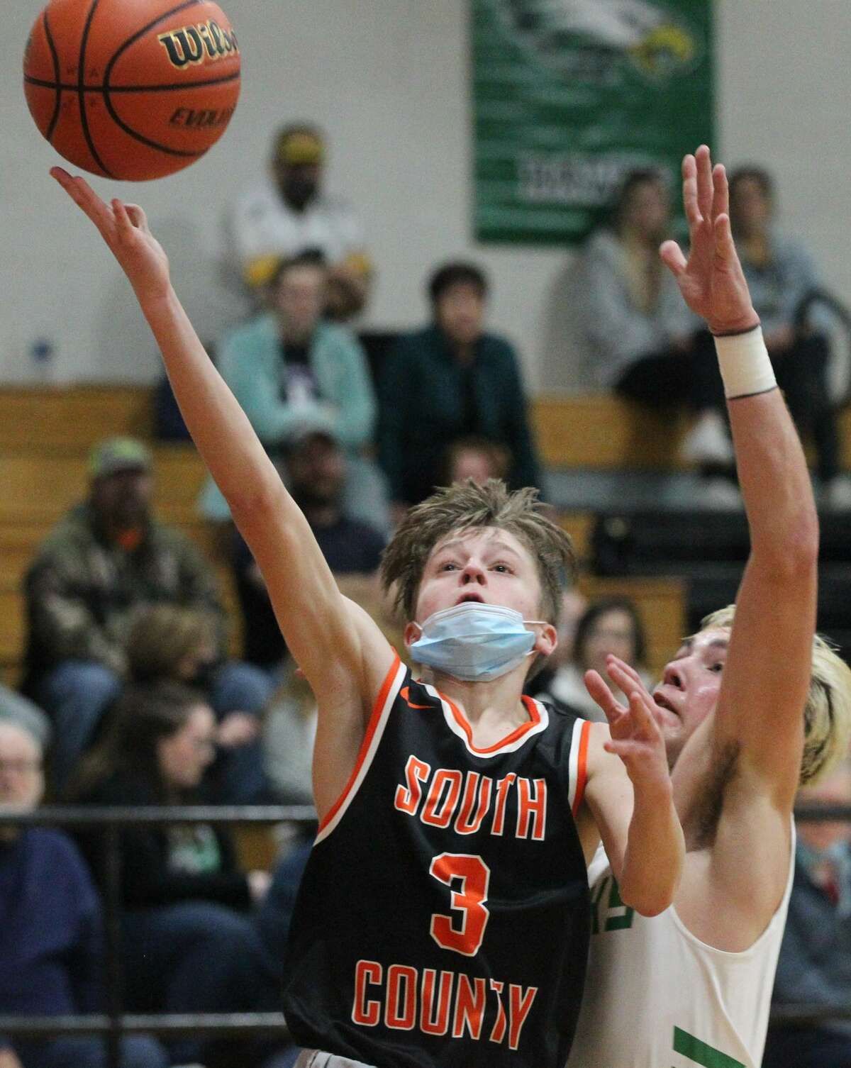 South County's Trevor Colwell puts up a shot during a boys' basketball game against Carrollton in the first round of the Waverly Holiday Tournament on Monday.