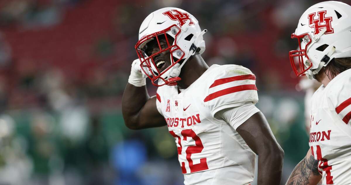 Houston running back Alton McCaskill reacts after scoring against South Florida during the second half of an NCAA college football game Saturday, Nov. 6, 2021, in Tampa, Fla. (AP Photo/Scott Audette)