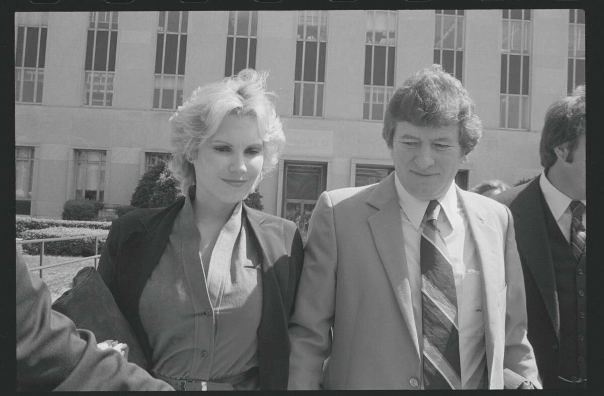 Former U.S. Rep. John Jenrette of South Carolina and his wife, Rita Jenrette, pause to talk with reporters as they return from a lunch break on Oct. 7, 1980, to await the jury's decision in his federal bribery trial.