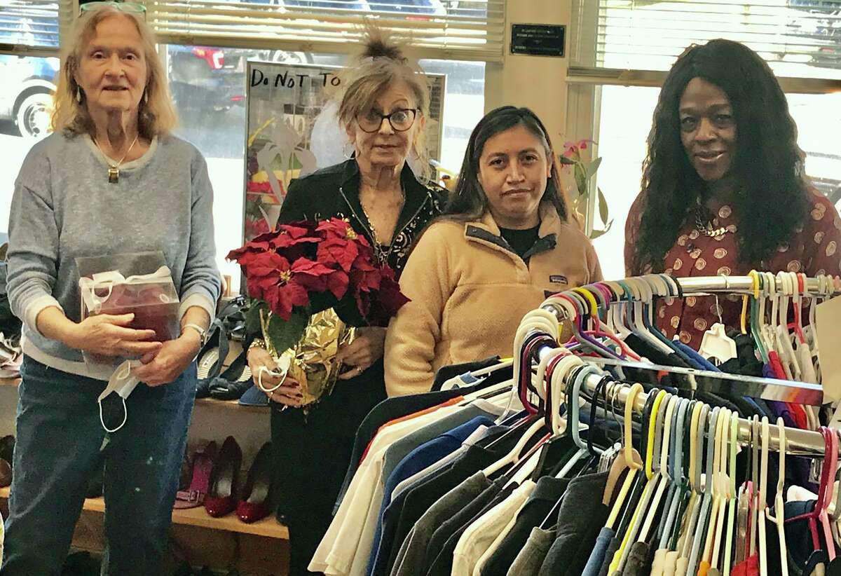 From left, Clothing Bank volunteers Maggie Gouin, Anita Ruggiero, Angelica Salg, and clothing coordinator Joan McFarlane-Nwagboli.