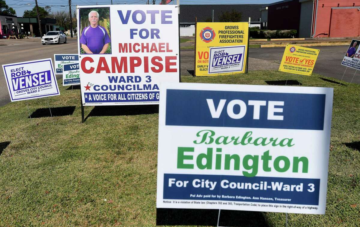 Election signs fill the walk outside Groves City Hall before Tuesday's election. Groves and Bevil Oaks voters will both head to the polls for elected positions and propositions. Photo made Monday, November 1, 2021 Kim Brent/The Enterprise