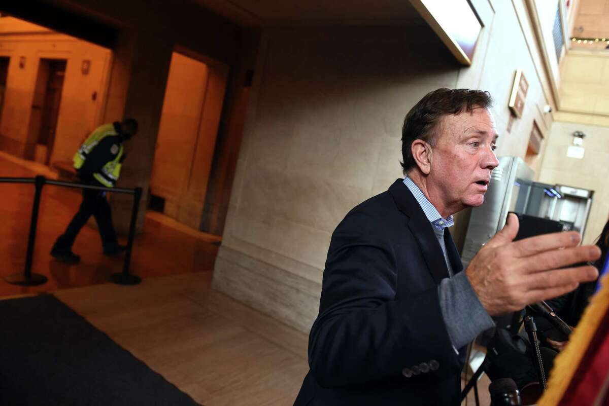 Governor Ned Lamont speaks to the press about the omicron variant following the signing of a lease for a partnership agreement for Union Station and State Street Station in New Haven on December 21, 2021.