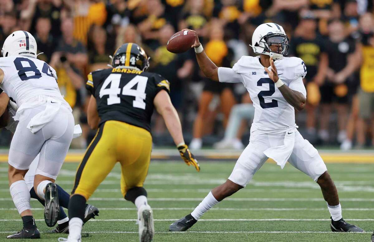 Penn State quarterback Ta’Quan Roberson looks to pass during the second half against Iowa on Oct. 9. Roberson is transferring to UConn.