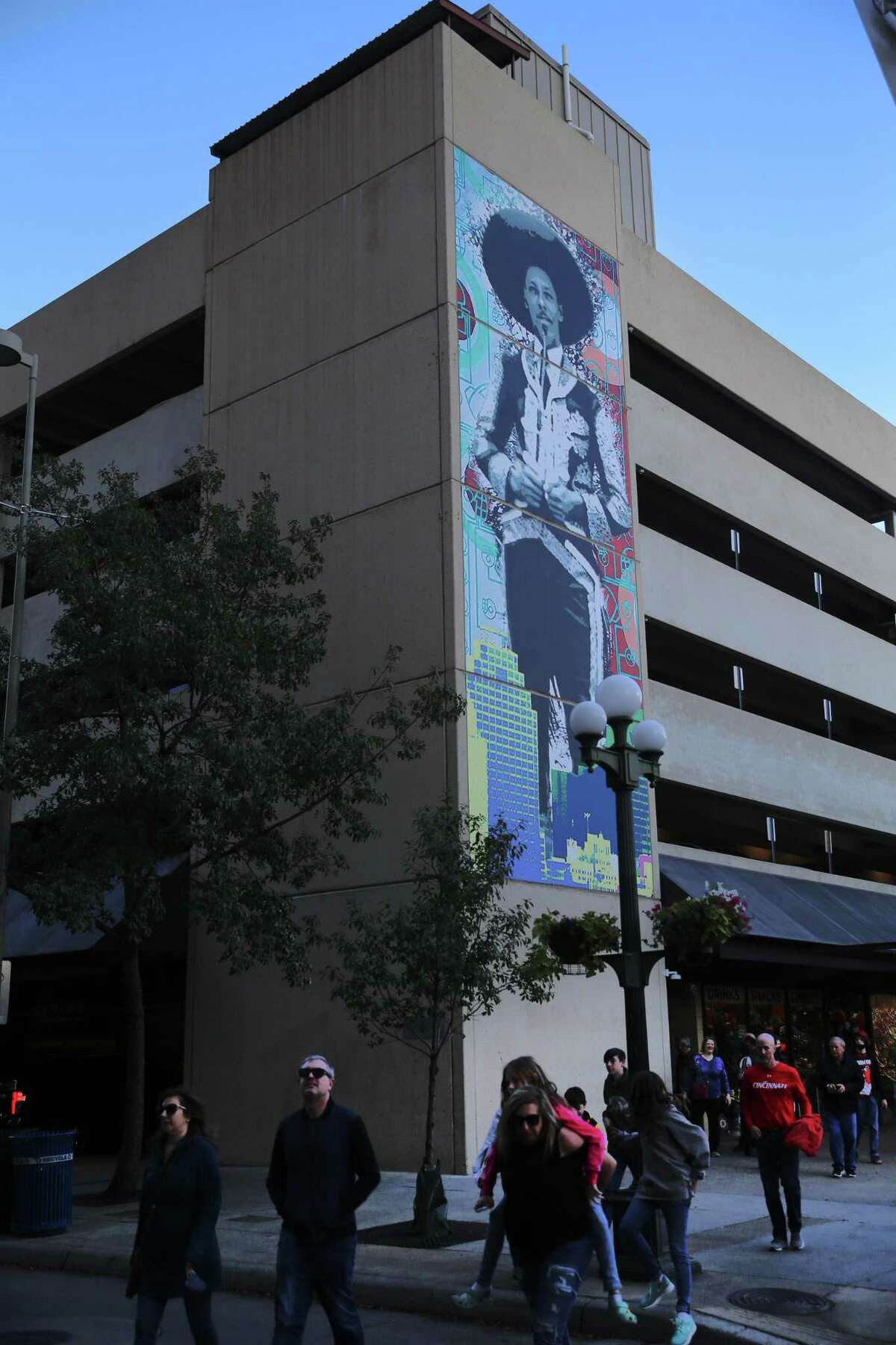 Artist Luis Valdera’s mural “Sky, Earth and Mariachi Lecho Over San Antonio” depicts a larger-than-life mariachi looming over the city’s skyline.