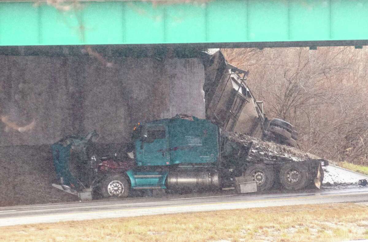 A truck that was hauling grain was separated from its trailer after hitting an overpass at Old U.S. 36 and Interstate 72.
