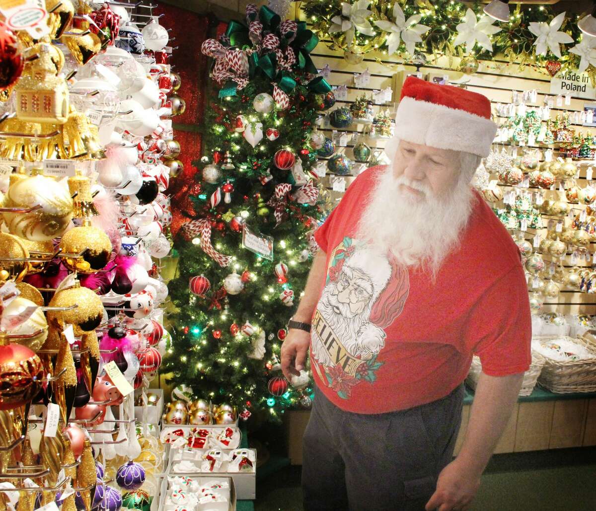 David York, of Youngstown, Ohio looks over ornaments and Christmas decorations at Bronner’s CHRISTmas Wonderland in Frankenmueth, Michigan. York started portraying Santa about nine years ago, and has adopted it as a year-round lifestyle. He and other Christmas fanatics are drawn to the store, which features approximately 50,000 holiday items for sale.