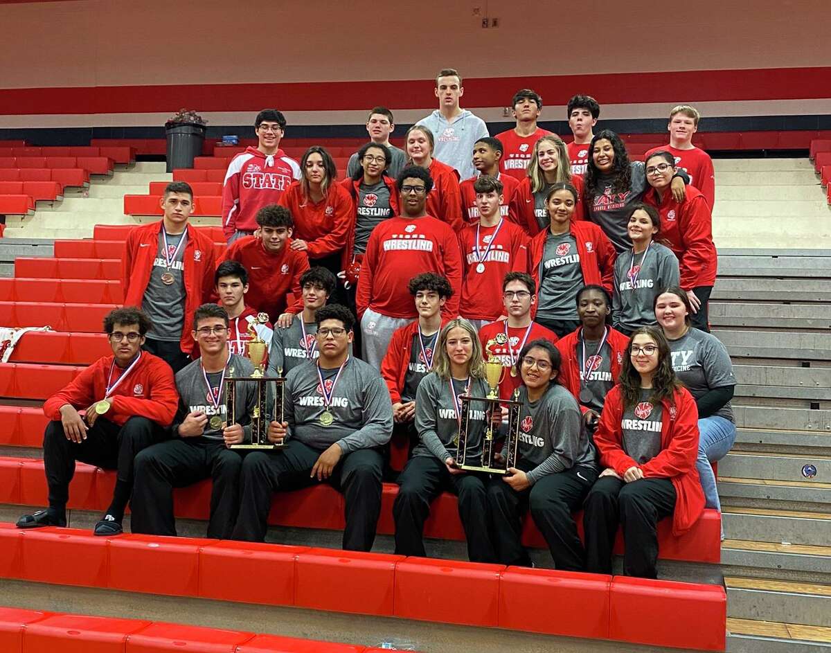 The Katy wrestling teams took the girls and boys team championships at the Falcon Invite, Dec. 18 at Clear Lake High School.