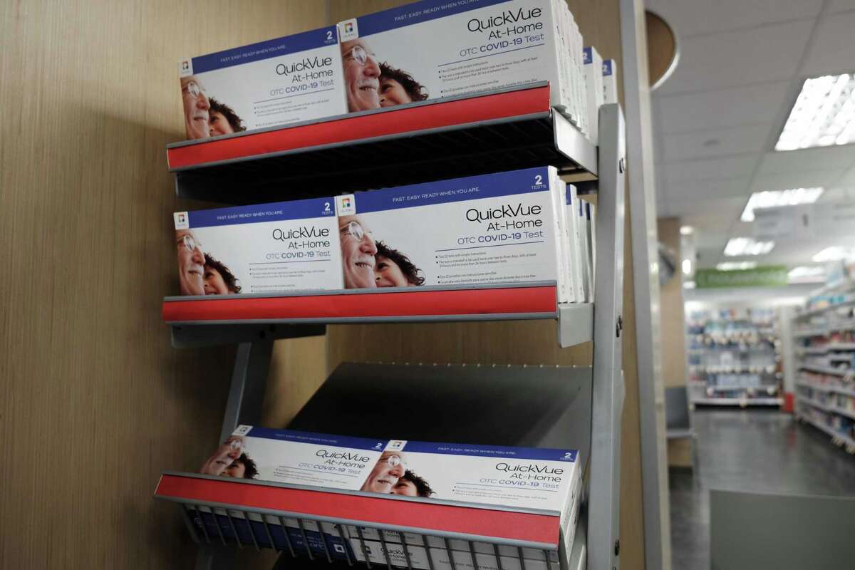 A take-home COVID-19 testing kit is displayed on the shelf of a Manhattan drugstore on December 22, 2021 in New York City.