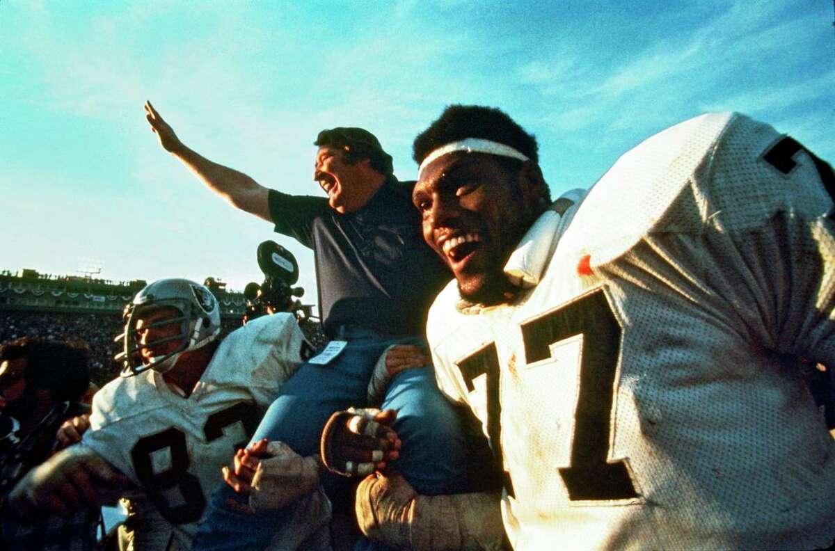 Raiders' head coach John Madden celebrates in the Oakland 32-14 win over the Vikings at the Super Bowl XI game of the Oakland Raiders vs the Minnesota Vikings played at the Rose Bowl in Pasadena, California on January 9, 1977. (Photo by Dennis Desprois/Getty Images)