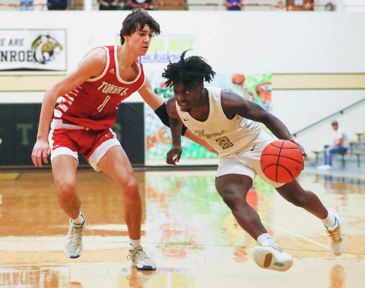 Conroe point guard Trashaun Kindle (2) drives to the basket during a game at the Conroe Christmas Classic at Conroe High School, Tuesday, Dec. 28, 2021, in Conroe.