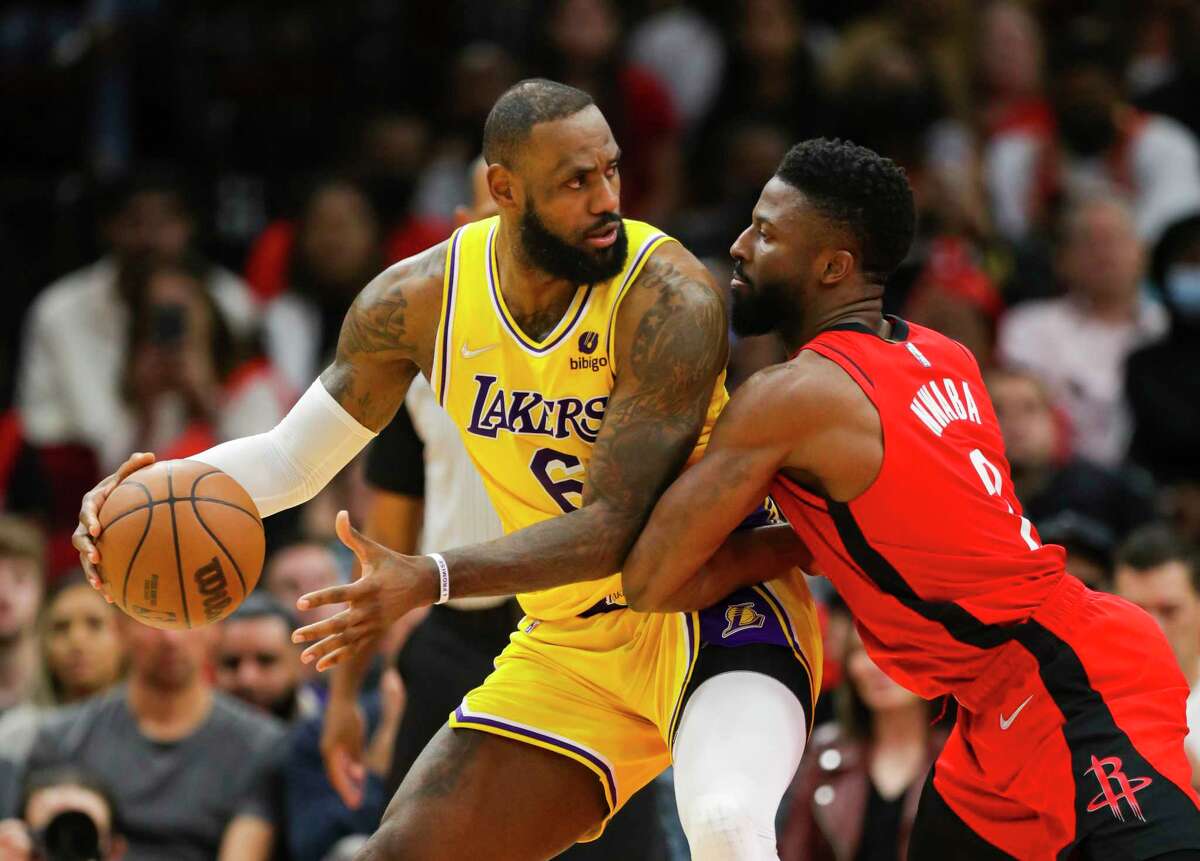 LeBron James, going against the Rockets' David Nwaba earlier this season, is listed as questionable for Wednesday's game with a sore left knee.