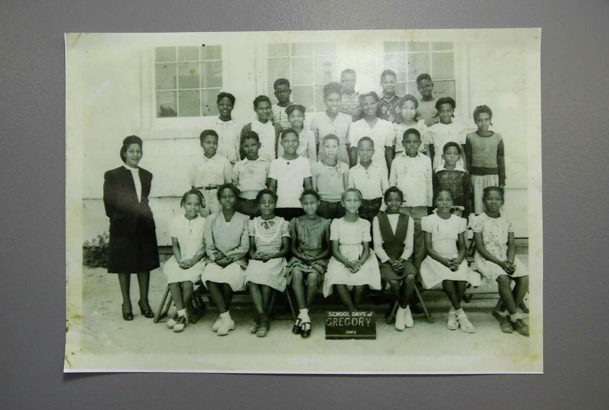 A historical photo hangs on the wall Friday, Oct. 29, 2021, at the African American Library at the Gregory School in Houston.