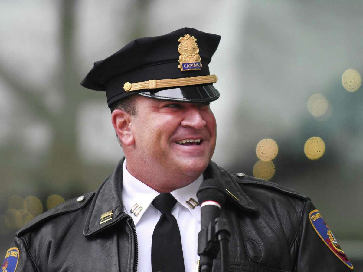 Stamford Police Capt. Diedrich Hohn speaks at a press conference outside the Government Center in Stamford, Conn. Wednesday, Dec. 29, 2021. Stamford received a $550,000 grant from the U.S. Department of Justice to help the Stamford Police Department improve public safety responses for those with mental health and substance abuse issues. The grant will allow the Stamford Police Department to hire social workers to assist officers responding to pertinent calls to conduct mental health assessments, coordinate care, and provide referrals for those in need of assistance.