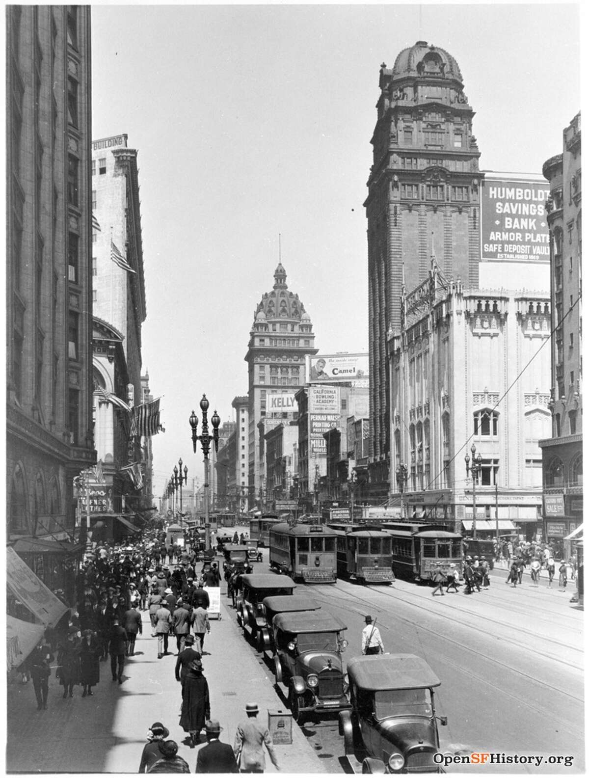 A 1922 view of Market near 4th, with the California Theatre, Humboldt Bank building and Call Building visible.