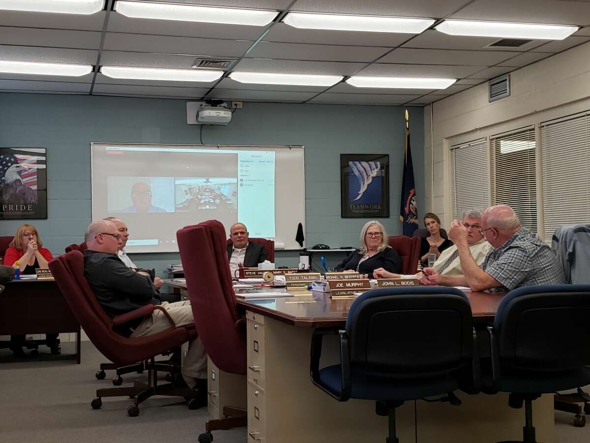 Members of the Huron County Board of Commissioners before their meeting on Tuesday, their last meeting of the year. The commissioners did discuss the possibility of having a new millage to pay for public safety services in the future.