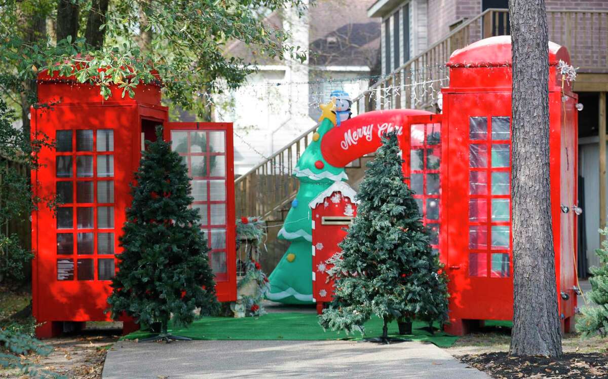 A pair of large phone booths are seen at Acorn Manor Assisted Living Homes, Wednesday, Dec. 29, 2021, in Spring. Priyanka Johri created “The Wind Phones of The Woodlands” to provide solace to people who have had loved ones die. The concept is placing a phone that is not connected in a private phone booth that is available to anyone who wants to talk to someone who cannot hear them anymore.