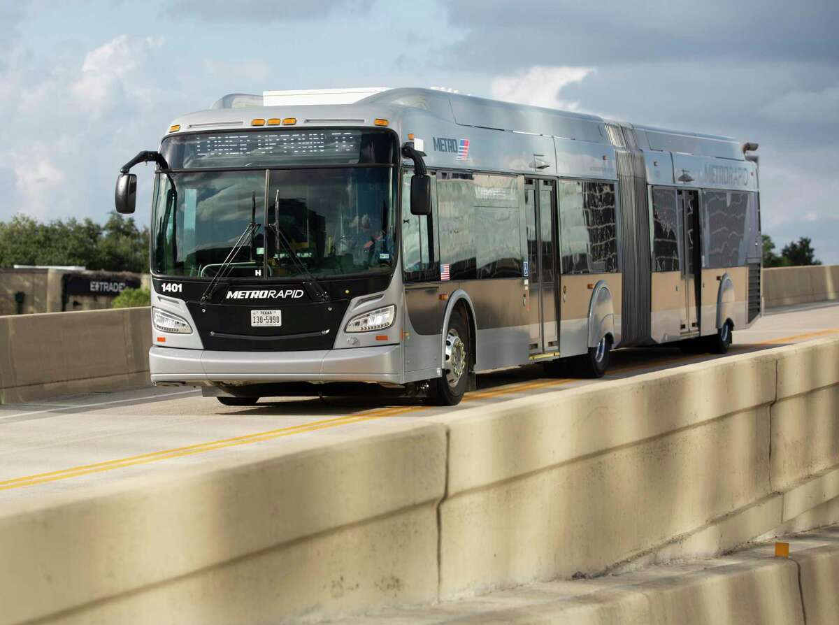 A Metropolitan Transit Authority Silver Line bus is photographed along the Loop 610 busway during rush hour on Oct. 12, 2021, in Houston.