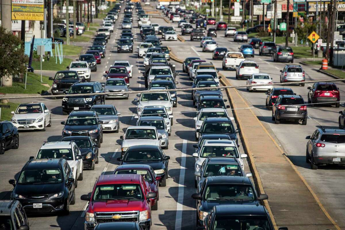 Traffic is backed up on Rayford Road at Interstate 45 north Monday, Oct. 11, 2021 in The Woodlands.