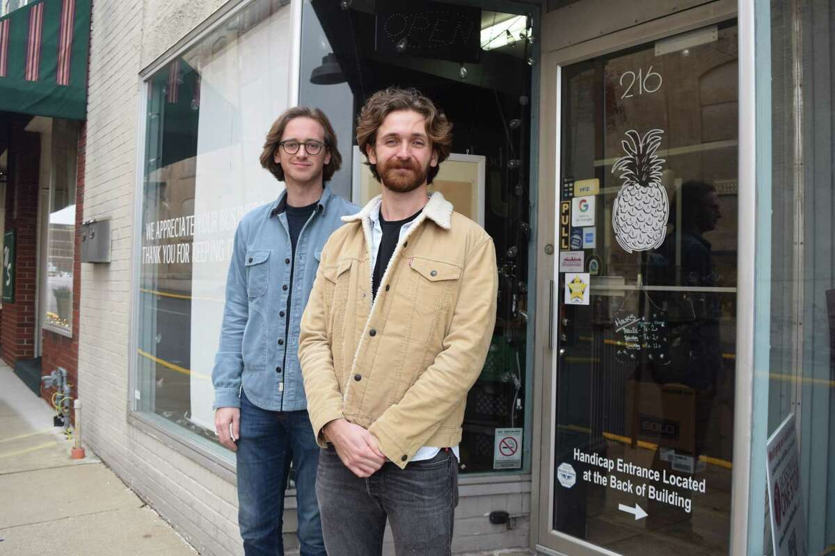 Elm City Roastery in Jacksonville has new owners — brothers Stuart (left) and Ben Smith — and will reopen on Jan. 15.