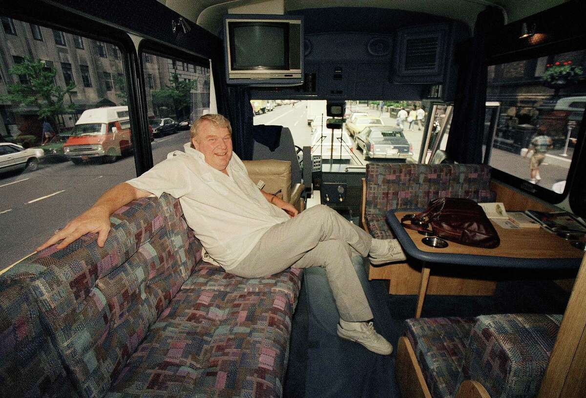 John Madden enjoys the comforts of his custom-made bus in 1987. His weakness — claustrophobia — became his strength.